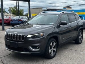 2018 Jeep Grand Cherokee showcasing sleek design, spacious interior, advanced technology features, and rugged off-road capability.