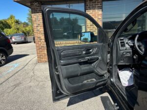 2019 RAM 1500 showcasing rugged design, spacious interior, advanced tech features, and powerful performance suitable for tough terrains.