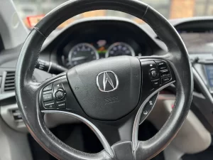 The 2017 Acura MDX showcasing its sleek design, premium interior, and modern features for a comfortable driving experience.