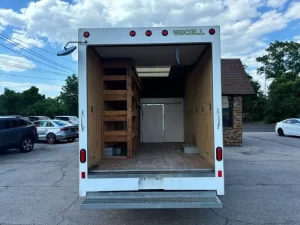 2018 Ford E-Series E 350 parked outdoors, showcasing its robust design and spacious build.