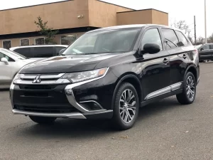 The 2018 Mitsubishi Outlander ES 4dr SUV showcasing its sleek design, spacious interior, and modern features, perfect for family adventures.