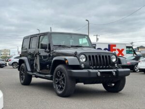 2017 Jeep Wrangler Unlimited SUV, 4WD with 3.6L V6 engine, 91,719 miles, black exterior and interior, 4 doors, financing available.