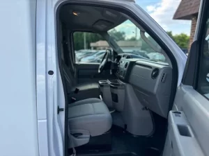 2018 Ford E-Series E 350 parked outdoors, showcasing its robust design and spacious build.