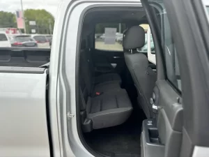 A 2018 Chevrolet Silverado 1500 showcasing its bold design, sturdy build, and sleek detailing under natural lighting.