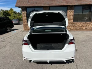 2021 Toyota Camry SE in a sleek design, showcasing its modern styling and bold appearance.