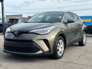 The 2021 Toyota C-HR LE showcases a sleek design with modern lines and refined details, highlighting its stylish and dynamic appeal.