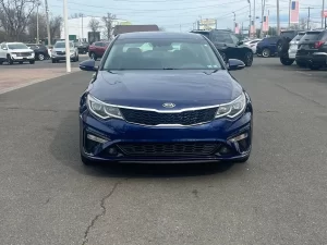 The 2019 Kia Optima showcasing its sleek design, premium interior, and modern features for a comfortable driving experience.