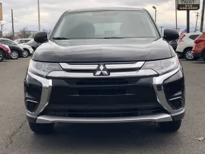 The 2018 Mitsubishi Outlander ES 4dr SUV showcasing its sleek design, spacious interior, and modern features, perfect for family adventures.