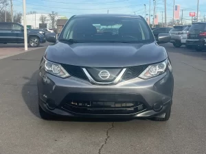 A 2019 Nissan Rogue Sport S AWD 4dr Crossover in a dynamic setting, showcasing its sleek design, advanced features, and modern appeal.