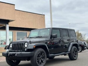 2017 Jeep Wrangler Unlimited SUV, 4WD with 3.6L V6 engine, 91,719 miles, black exterior and interior, 4 doors, financing available.