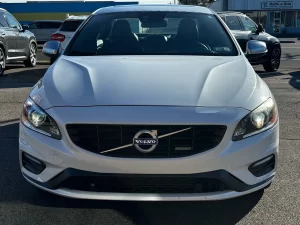 The 2015 Volvo S60 T6 R showcases a sleek, dynamic design with a bold, athletic stance, emphasizing luxury and performance.