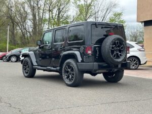 2017 Jeep Wrangler Unlimited SUV, 4WD with 3.6L V6 engine, 91,719 miles, black exterior and interior, 4 doors, financing available.