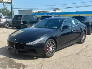 The 2017 Maserati Ghibli S Q4 features a sleek, dynamic design with premium wheels and a sophisticated interior, showcasing luxury and performance.