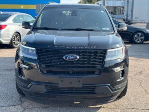 2018 Ford Explorer showcasing key features: spacious interior, advanced safety technology, powerful engine, and sleek exterior design.