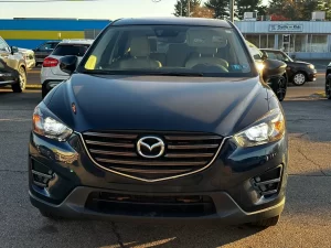 The 2016 Mazda CX-5 Grand Touring showcasing its elegant design, premium details, and modern styling features.