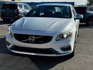 The 2015 Volvo S60 T6 R showcases a sleek, dynamic design with a bold, athletic stance, emphasizing luxury and performance.