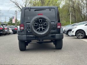 2017 Jeep Wrangler Unlimited SUV, 4WD with 3.6L V6 engine, 91,719 miles, black exterior and interior, 4 doors, financing available.