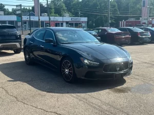 The 2017 Maserati Ghibli S Q4 features a sleek, dynamic design with premium wheels and a sophisticated interior, showcasing luxury and performance.