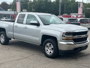 A 2018 Chevrolet Silverado 1500 showcasing its bold design, sturdy build, and sleek detailing under natural lighting.