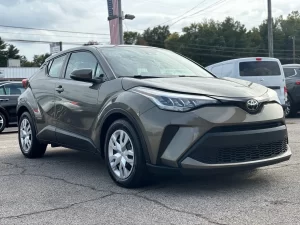 The 2021 Toyota C-HR LE showcases a sleek design with modern lines and refined details, highlighting its stylish and dynamic appeal.