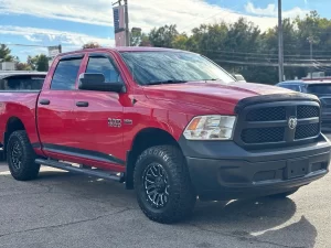 2016 RAM 1500 Express showcasing its robust design and bold style in a scenic outdoor setting.