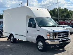 2018 Ford E-Series E 350 parked outdoors, showcasing its robust design and spacious build.