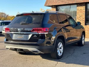 2019 Volkswagen Atlas parked in a scenic outdoor setting, showcasing its spacious design and modern features.