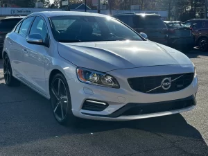 The 2015 Volvo S60 T6 R showcases a sleek, dynamic design with a bold, athletic stance, emphasizing luxury and performance.