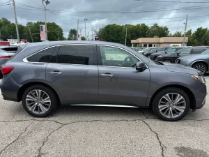 The 2017 Acura MDX showcasing its sleek design, premium interior, and modern features for a comfortable driving experience.