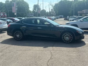 The 2017 Maserati Ghibli S Q4 features a sleek, dynamic design with premium wheels and a sophisticated interior, showcasing luxury and performance.