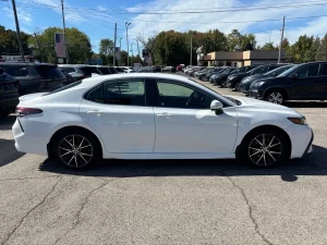 2021 Toyota Camry SE in a sleek design, showcasing its modern styling and bold appearance.