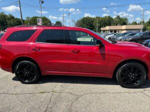 2019 Dodge Durango showcasing bold front grille, sleek body design, LED headlights, and spacious interior with advanced dashboard features.