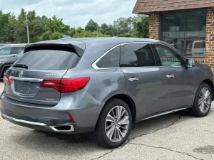 The 2017 Acura MDX showcasing its sleek design, premium interior, and modern features for a comfortable driving experience.