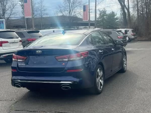 The 2019 Kia Optima showcasing its sleek design, premium interior, and modern features for a comfortable driving experience.