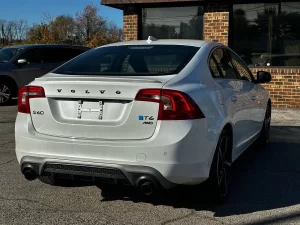 The 2015 Volvo S60 T6 R showcases a sleek, dynamic design with a bold, athletic stance, emphasizing luxury and performance.