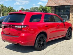 2019 Dodge Durango showcasing bold front grille, sleek body design, LED headlights, and spacious interior with advanced dashboard features.