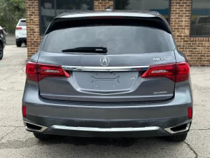 The 2017 Acura MDX showcasing its sleek design, premium interior, and modern features for a comfortable driving experience.