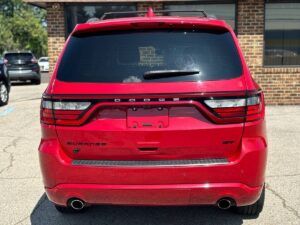 2019 Dodge Durango showcasing bold front grille, sleek body design, LED headlights, and spacious interior with advanced dashboard features.