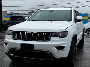 The 2018 Jeep Grand Cherokee featuring a sleek design, bold grille, and rugged performance for both city and off-road adventures.