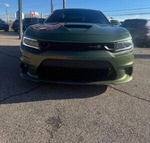 The 2022 Dodge Charger in a striking outdoor setting, highlighting its bold design, sleek lines, and powerful presence.