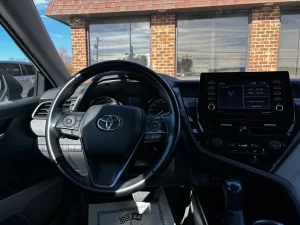 2022 Toyota Camry SE showcasing its sleek design and modern details.