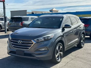 A sleek and modern 2016 Hyundai Tucson Limited, showcasing its elegant design, refined details, and premium features.