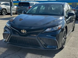 2022 Toyota Camry SE showcasing its sleek design and modern details.