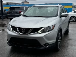 The 2017 Nissan Rogue Sport SL, featuring sleek design elements, advanced technology, and premium interior details.