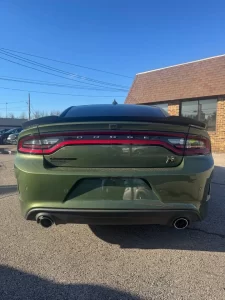 The 2022 Dodge Charger in a striking outdoor setting, highlighting its bold design, sleek lines, and powerful presence.