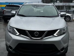 The 2017 Nissan Rogue Sport SL, featuring sleek design elements, advanced technology, and premium interior details.