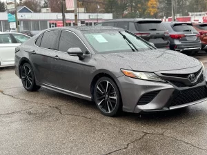 The 2018 Toyota Camry XSE features a sleek design with dynamic lines, alloy wheels, and a stylish interior that blends comfort with advanced technology.