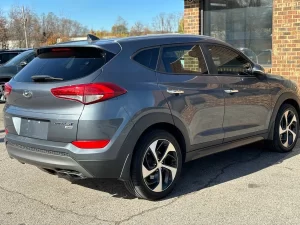 A sleek and modern 2016 Hyundai Tucson Limited, showcasing its elegant design, refined details, and premium features.