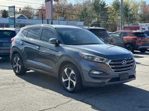 A sleek and modern 2016 Hyundai Tucson Limited, showcasing its elegant design, refined details, and premium features.