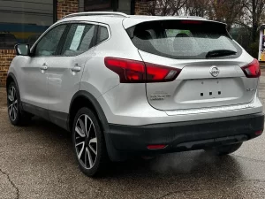 The 2017 Nissan Rogue Sport SL, featuring sleek design elements, advanced technology, and premium interior details.